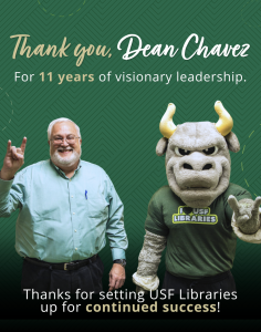 Text reads, thank you Dean Chavez for 11 years of visionary leadership - thanks for setting USF Libraries up for continued success. a man with white hair and beard smiles while holding up his right hand with "bull horns" he is joined by a bull mascor weaing a greent thsirt that reads "I heart ISF Libraries"